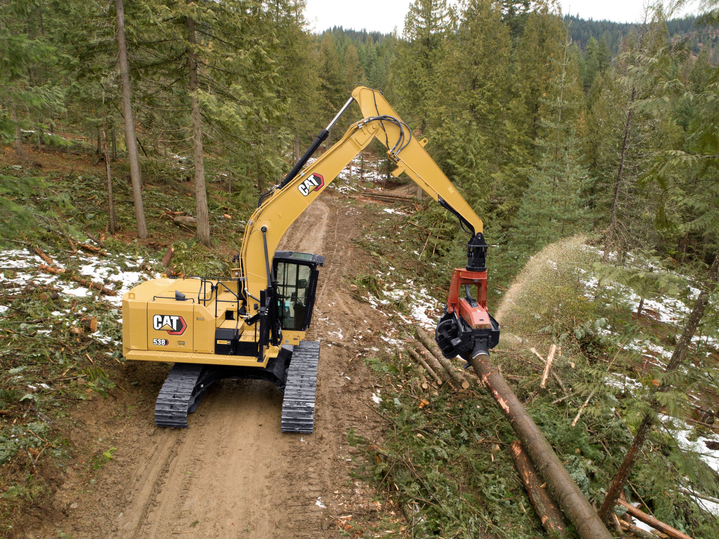 The Cat FM538 can process logs, build roads, load trucks, and more.