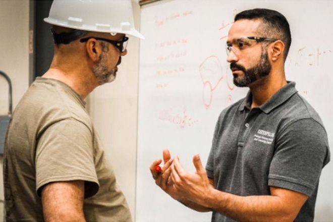 Instructor Talking to a Technician