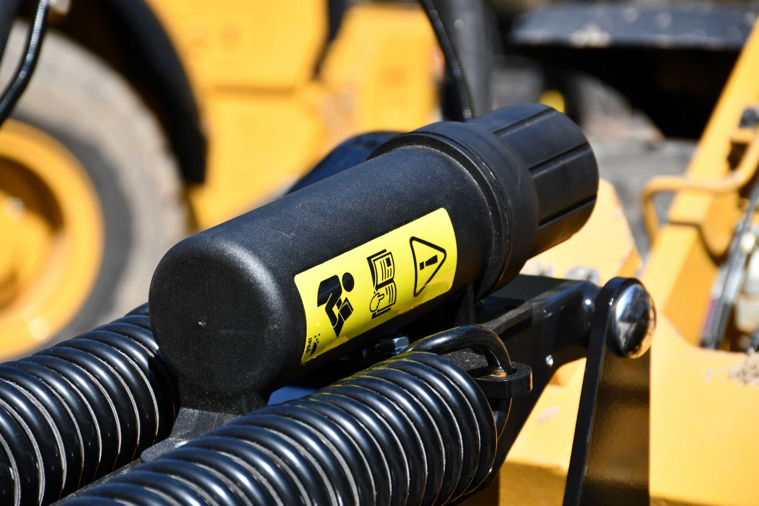 Support du guide d'utilisation et d'entretien monté sur l'outil