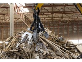 MH3024 Picking up from a pile of wood