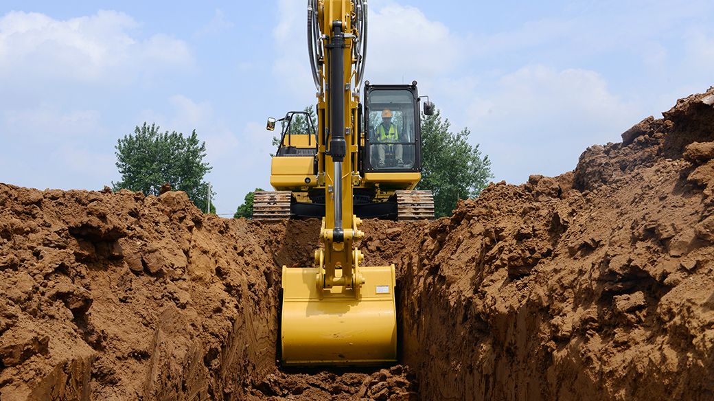 Female customer on jobsite with two male colleagues
