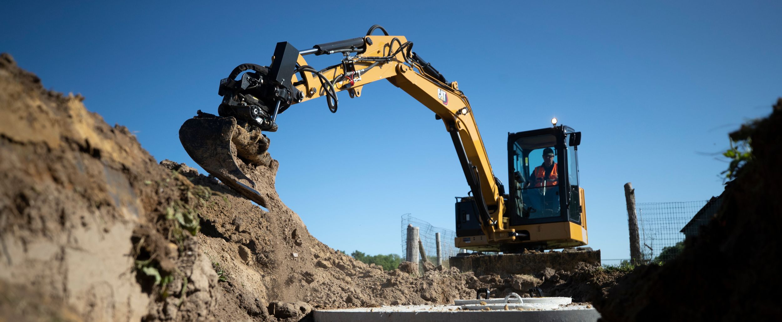 Cat SMART grader blade attachment on compact track loader