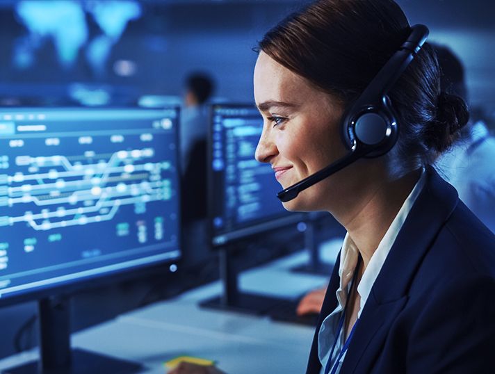 Call center personnel monitoring computer screens