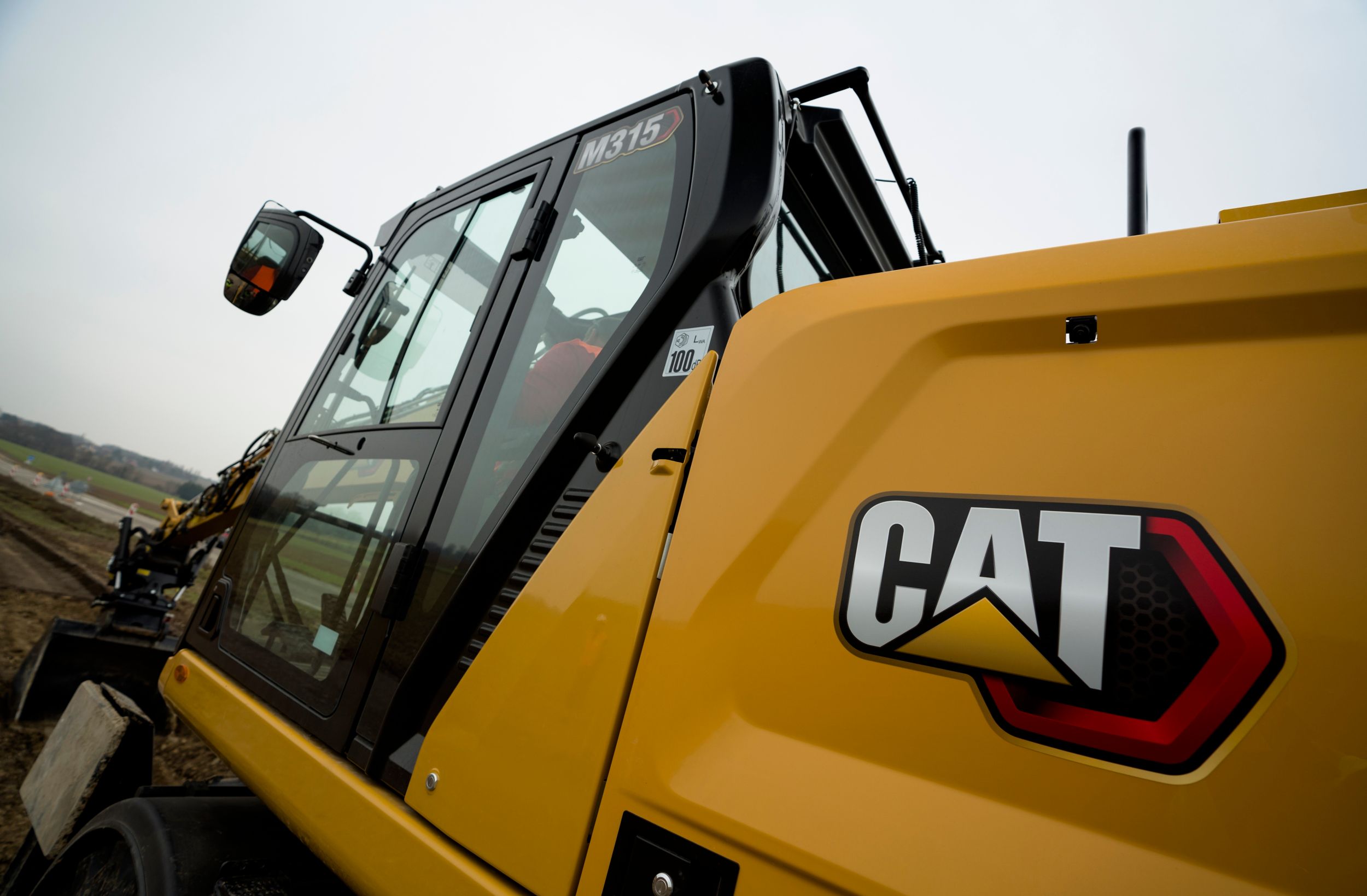 M315 Wheeled Excavator side profile