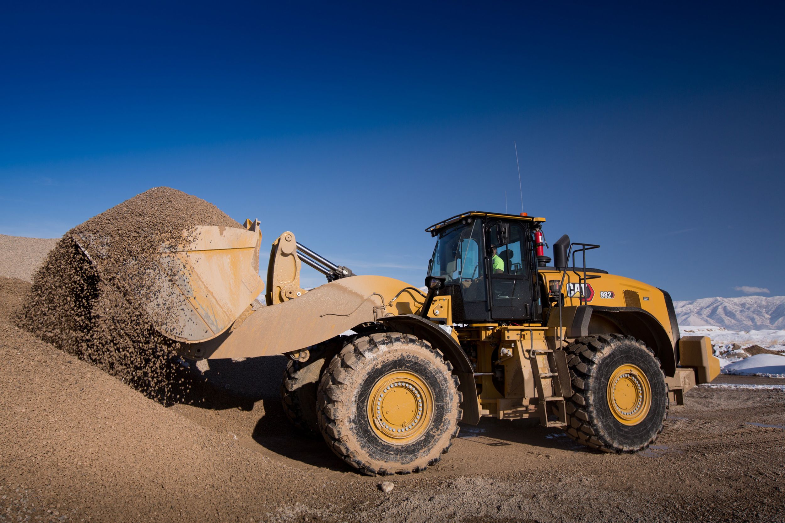 New Cat® 980 and 982 series wheel loaders deliver premium performance,  increased productivity and lower maintenance costs, Cat