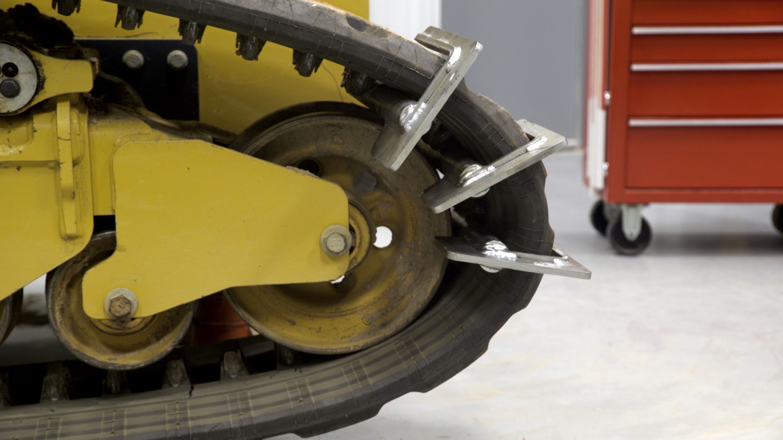 Track bar system tools on Compact Track Loader rubber track