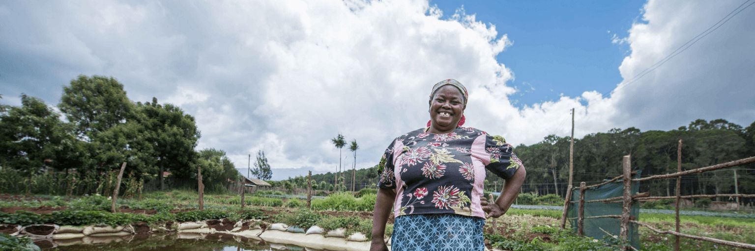 woman in front of river