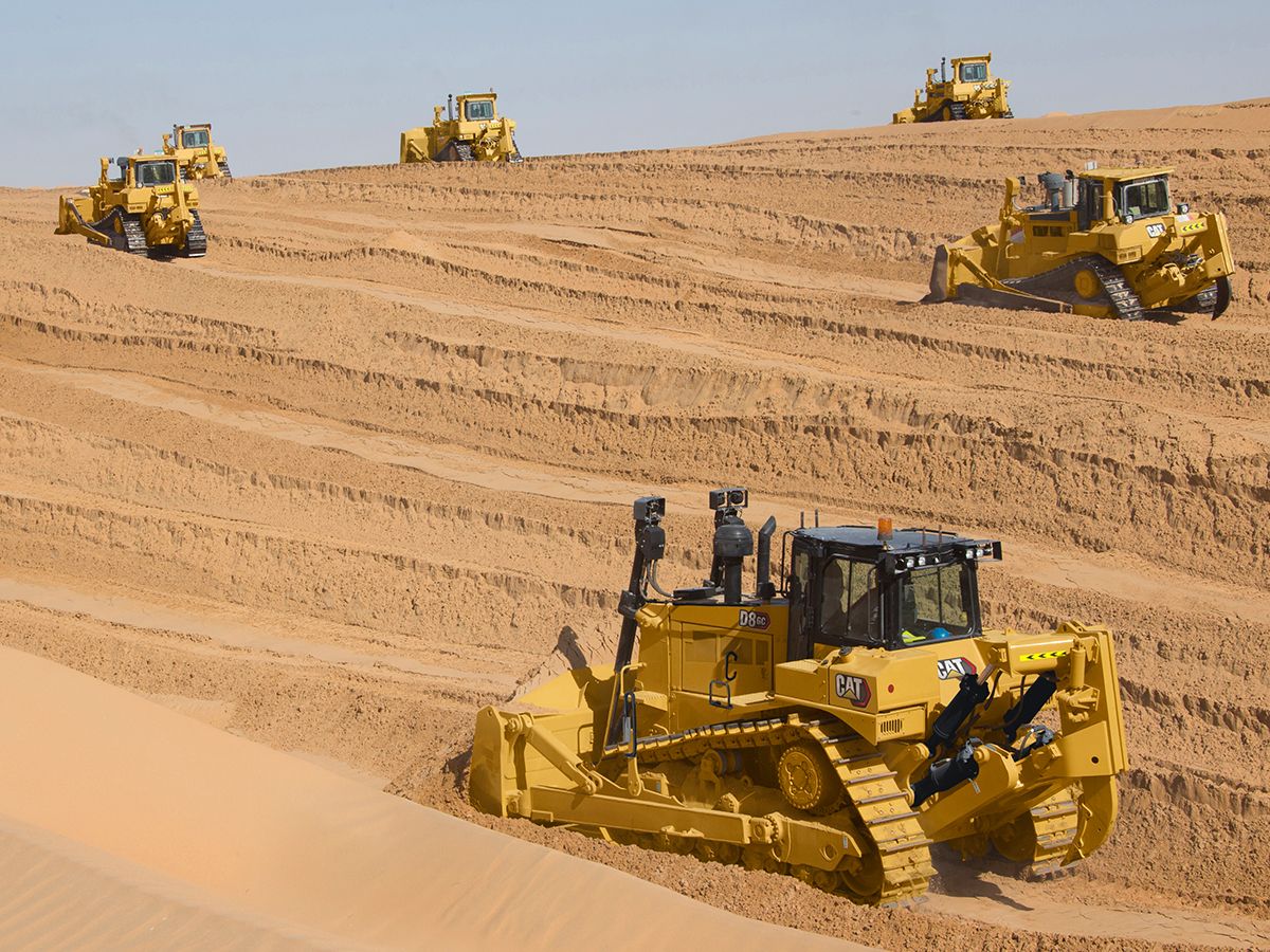 D8 GC working in the desert with a fleet of bulldozers