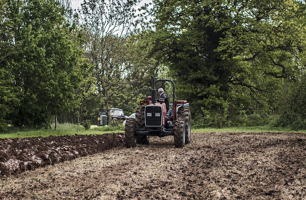 Tractor ploughing a field in the UK
