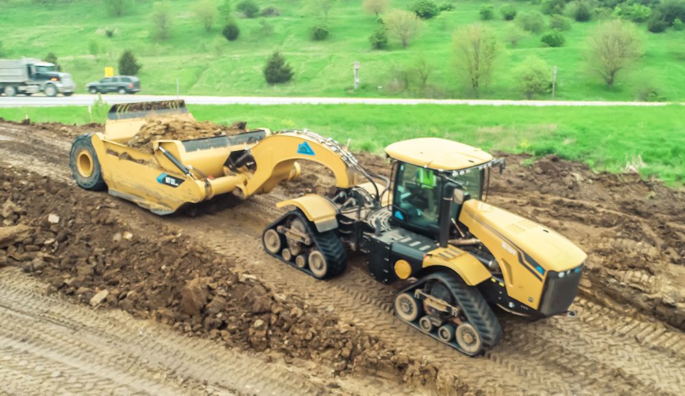 MTS tractor pulling load on site Image 1