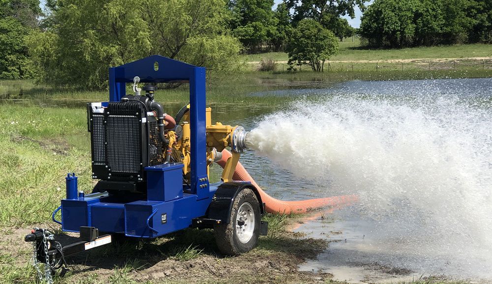 Barco pump pumping water into a lake