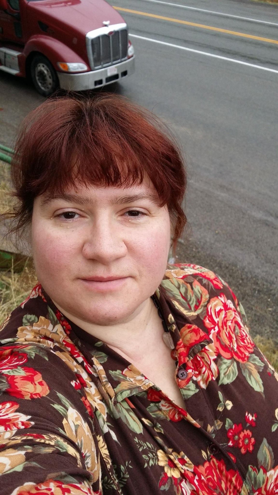Adele & her truck at Rogers Pass, MT Hwy 200, Montana.