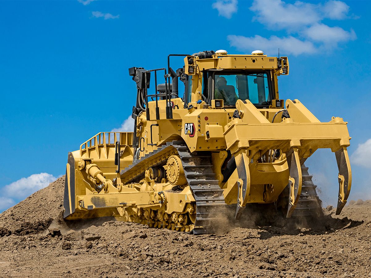 D8 bulldozer uitgerust met een ripper met meerdere schachten