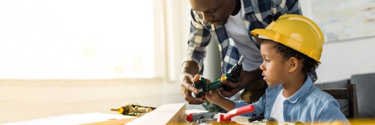 young boy in hard hat