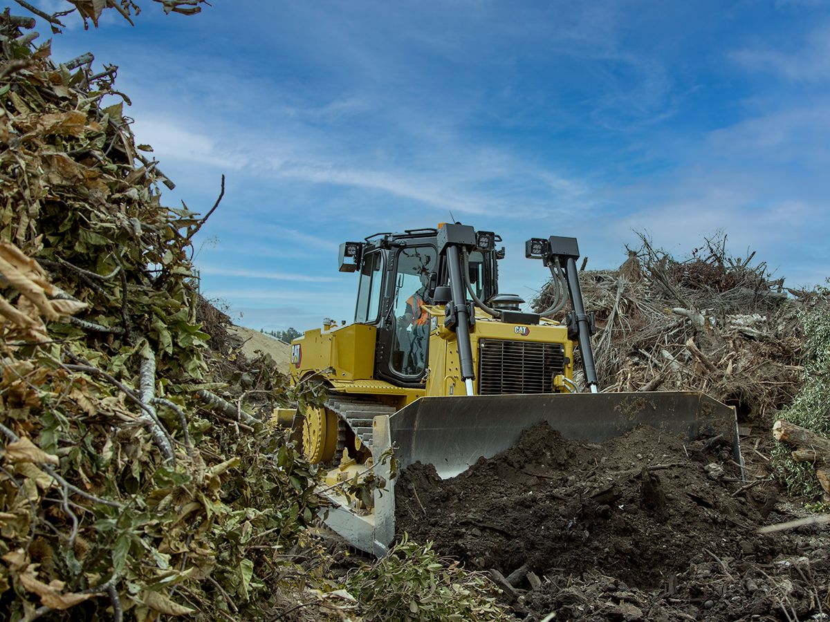 Cat D6R2 clearing land for a building site