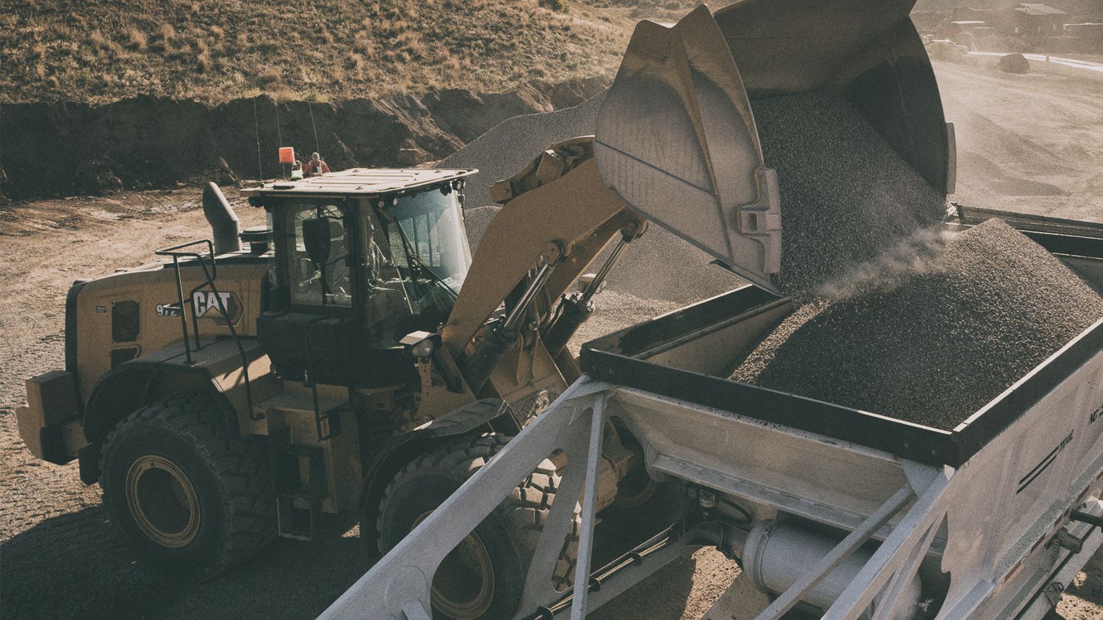 972 Wheel Loader dumping dirt on jobsite