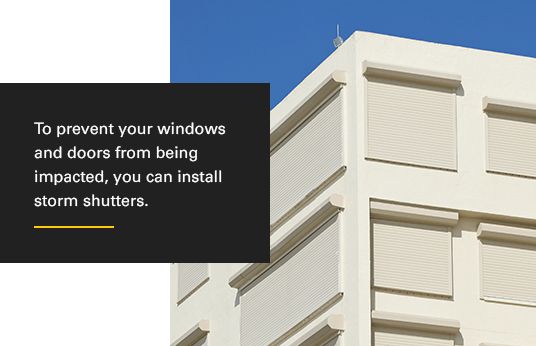 Install Storm Shutters or Plywood Sheets