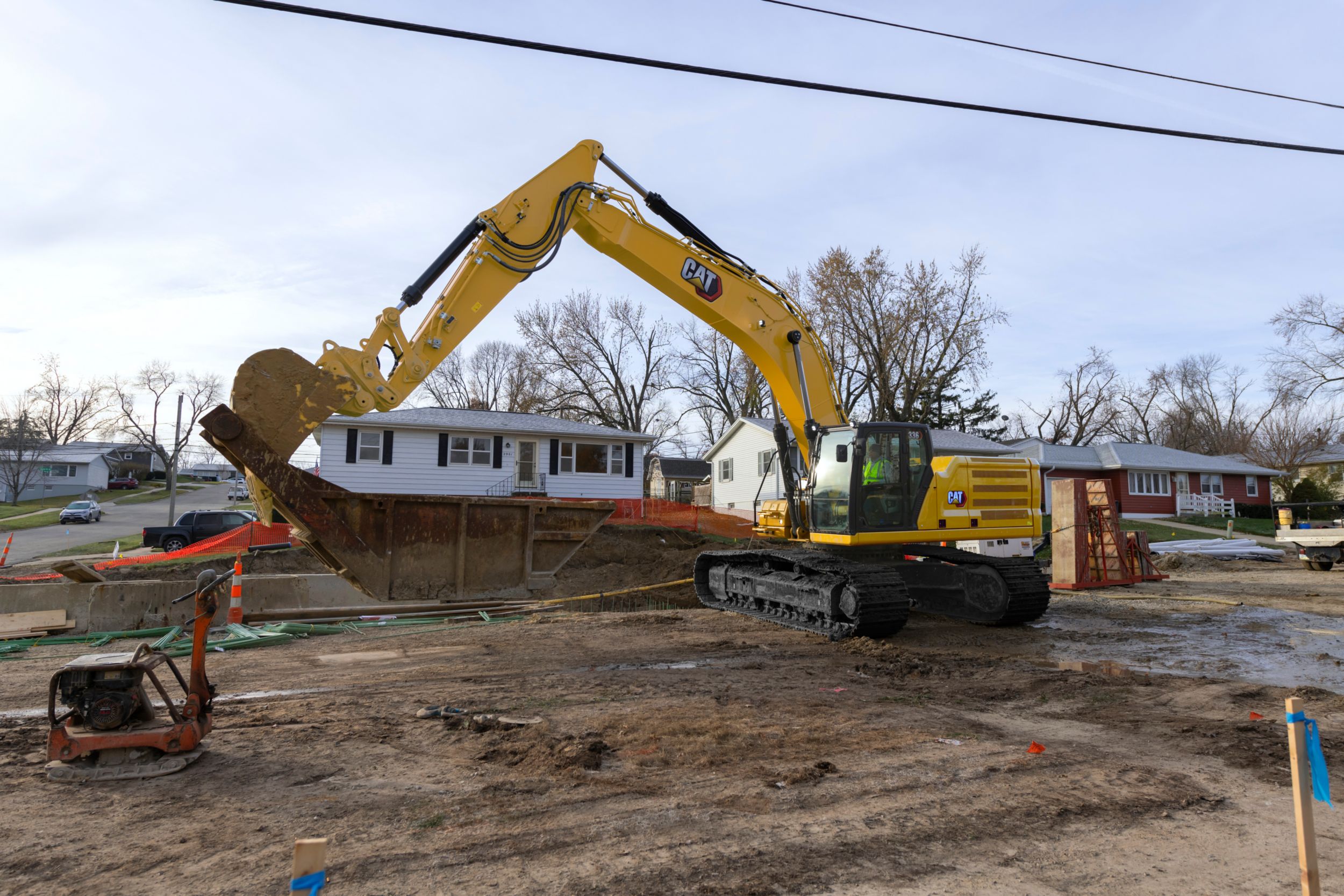 Auto heavy lift makes picking and placing heavy objects like sandboxes, manholes, and pipe easy.