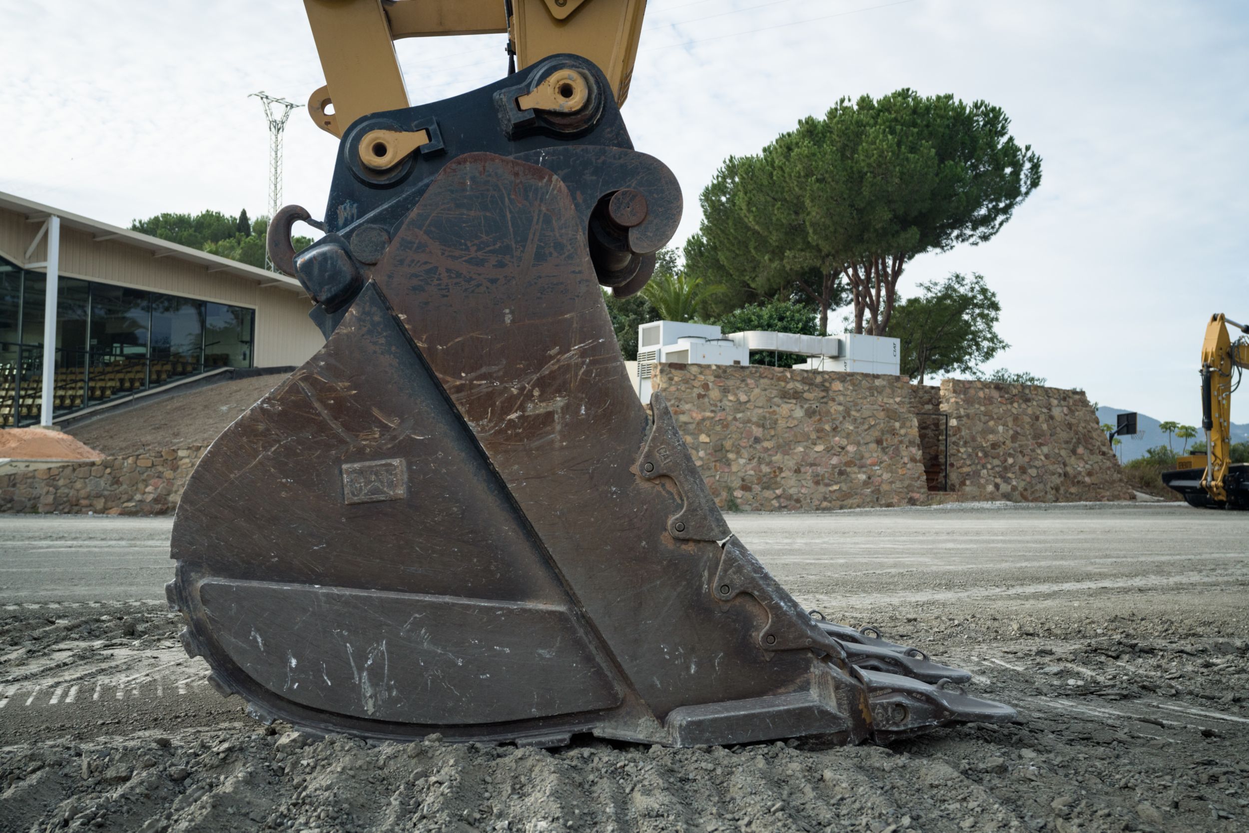 side edge protection added to excavator bucket