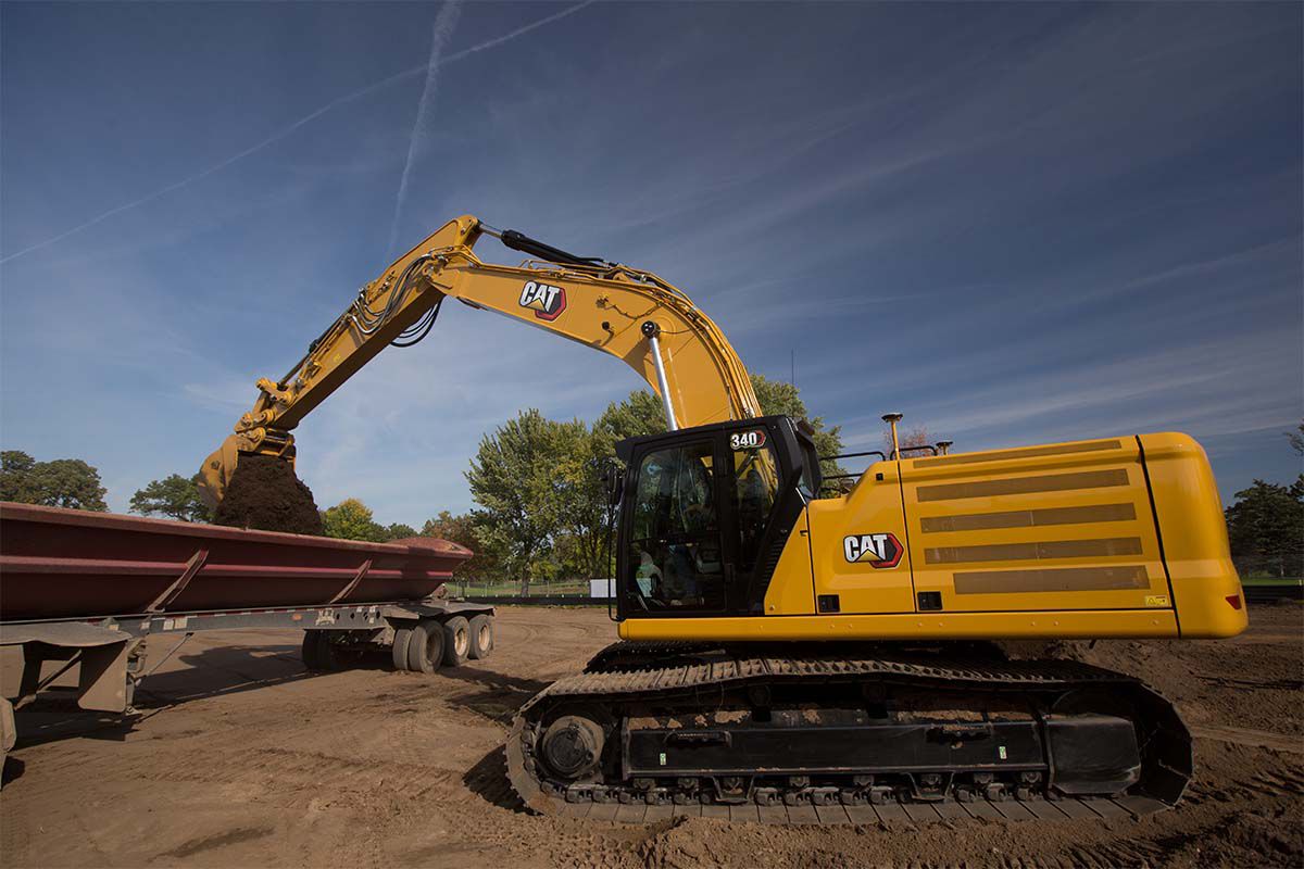 Cat® 340 hydraulic trackhoe excavator bring premium power, performance, control, digging, trenching, and heavy lifting capacity to your large scale projects.