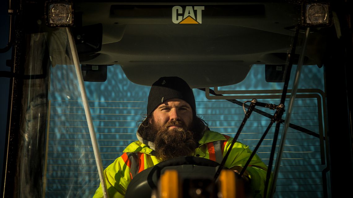 Operator removing snow