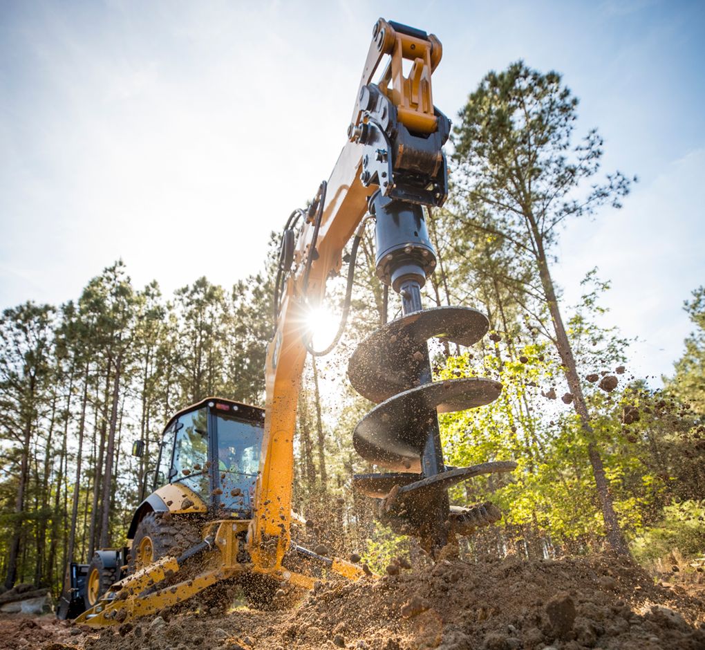 Backhoe Loader Auger Attachment