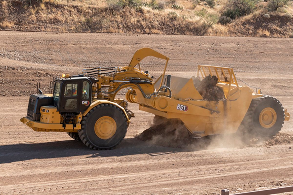 Caterpillar 657g скрепер