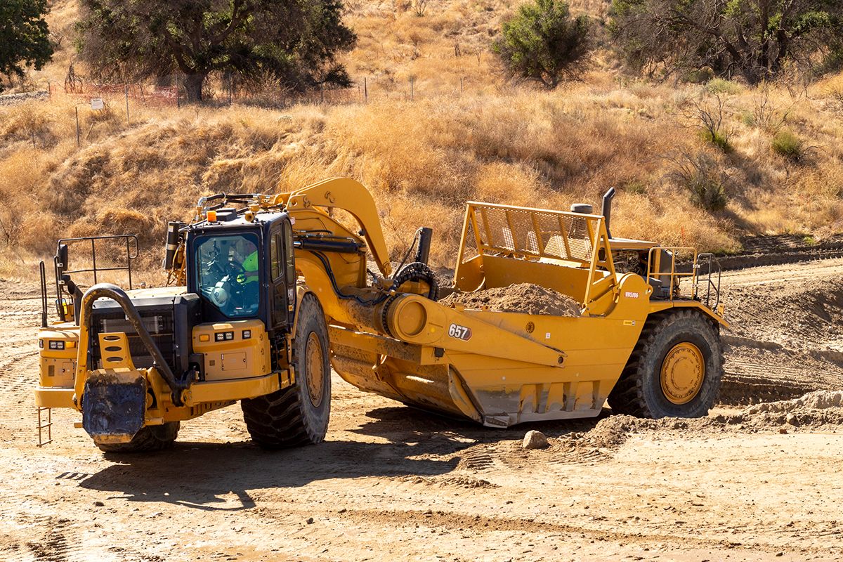 Cat Grade Control pour décapeuses automotrices sur pneus_0