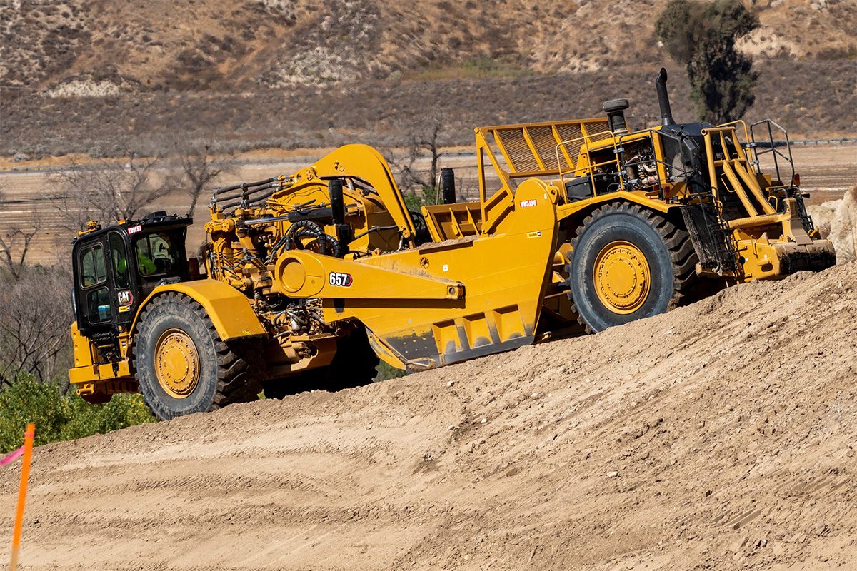 Функция Sequence Assist для колесных тракторов-скреперов | Cat | Caterpillar