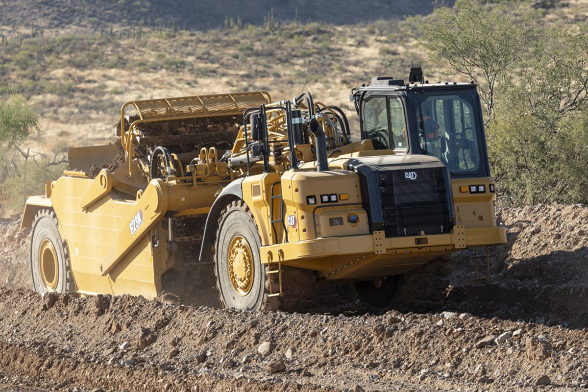 Caterpillar 657g скрепер