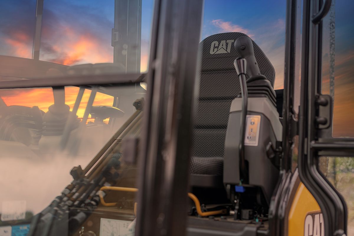 Next Generation Cat Mini Excavators offer a sealed and pressurized cab with AC for a more comfortable operating experience.