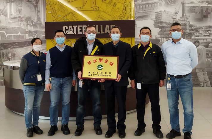 Team gathered to receive award