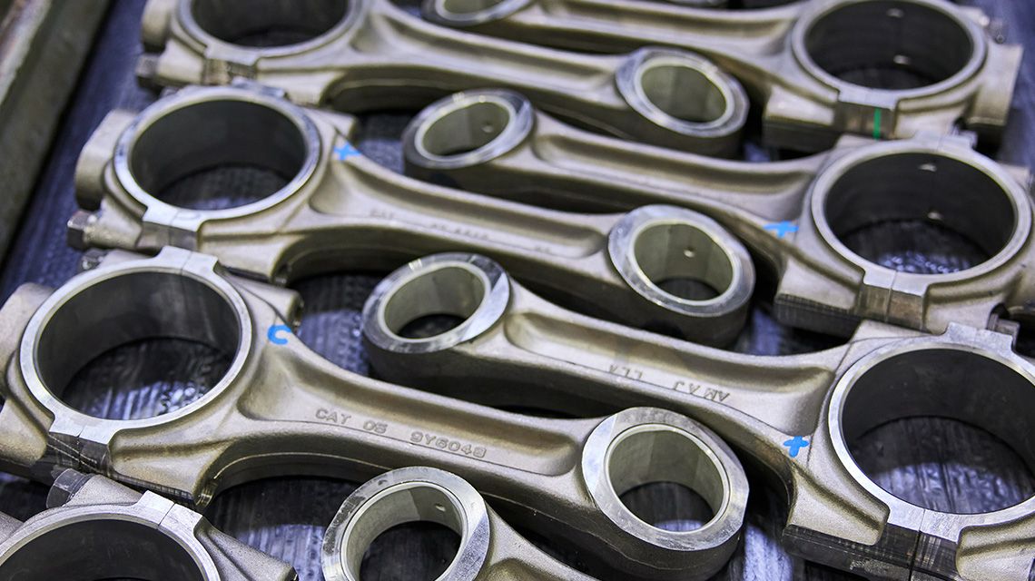 Cat Reman camshafts on bench