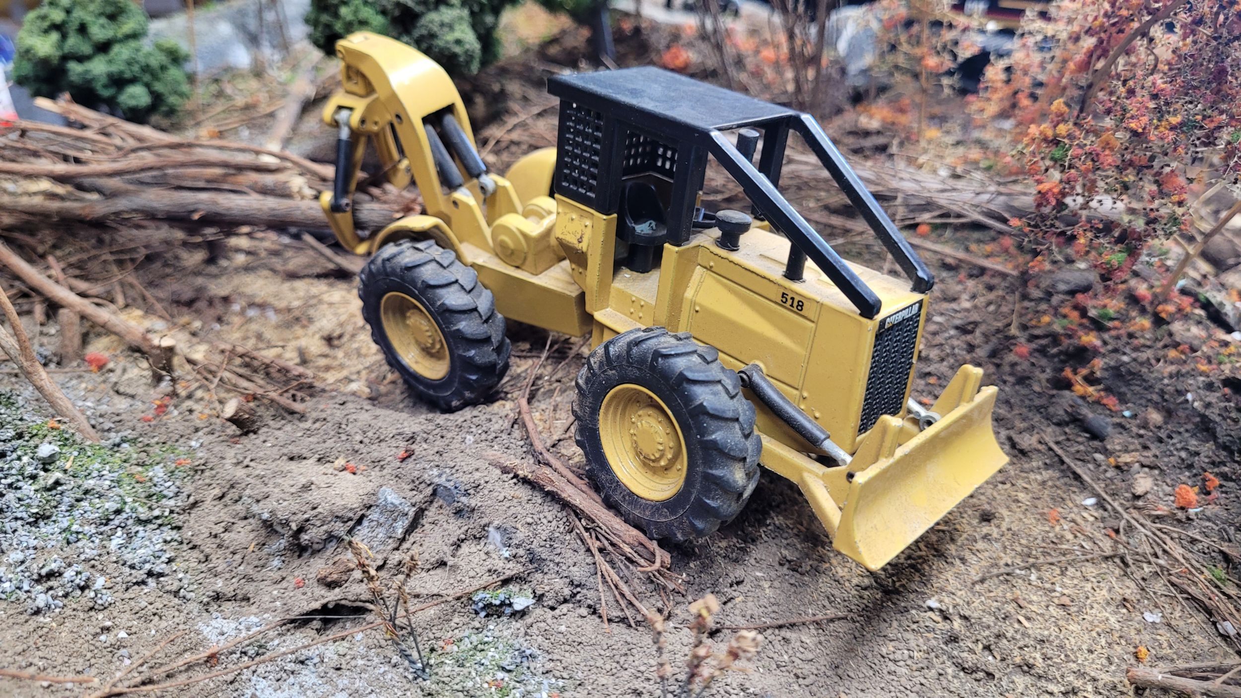 scale model of a Cat 518 