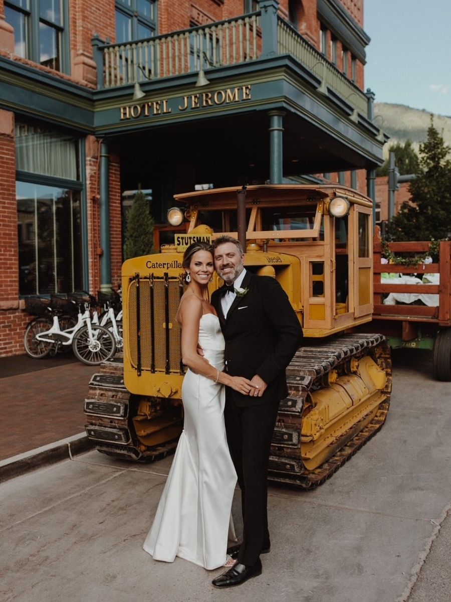 Shay Stutsman and wife Carlie on their wedding day with his 1940 Caterpillar D6