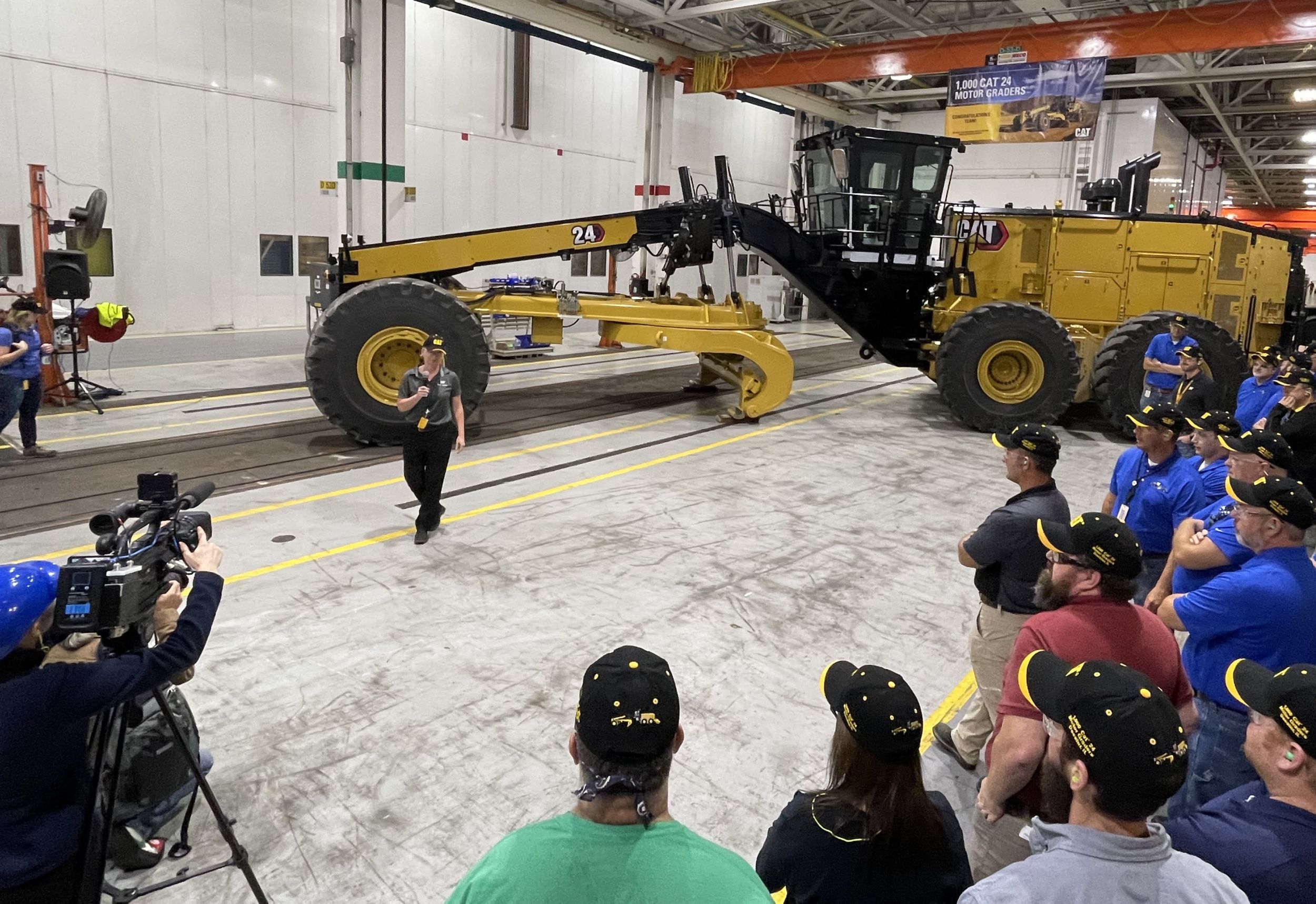 Leader delivering remarks at the 1000th 24 Motor Grader celebration 