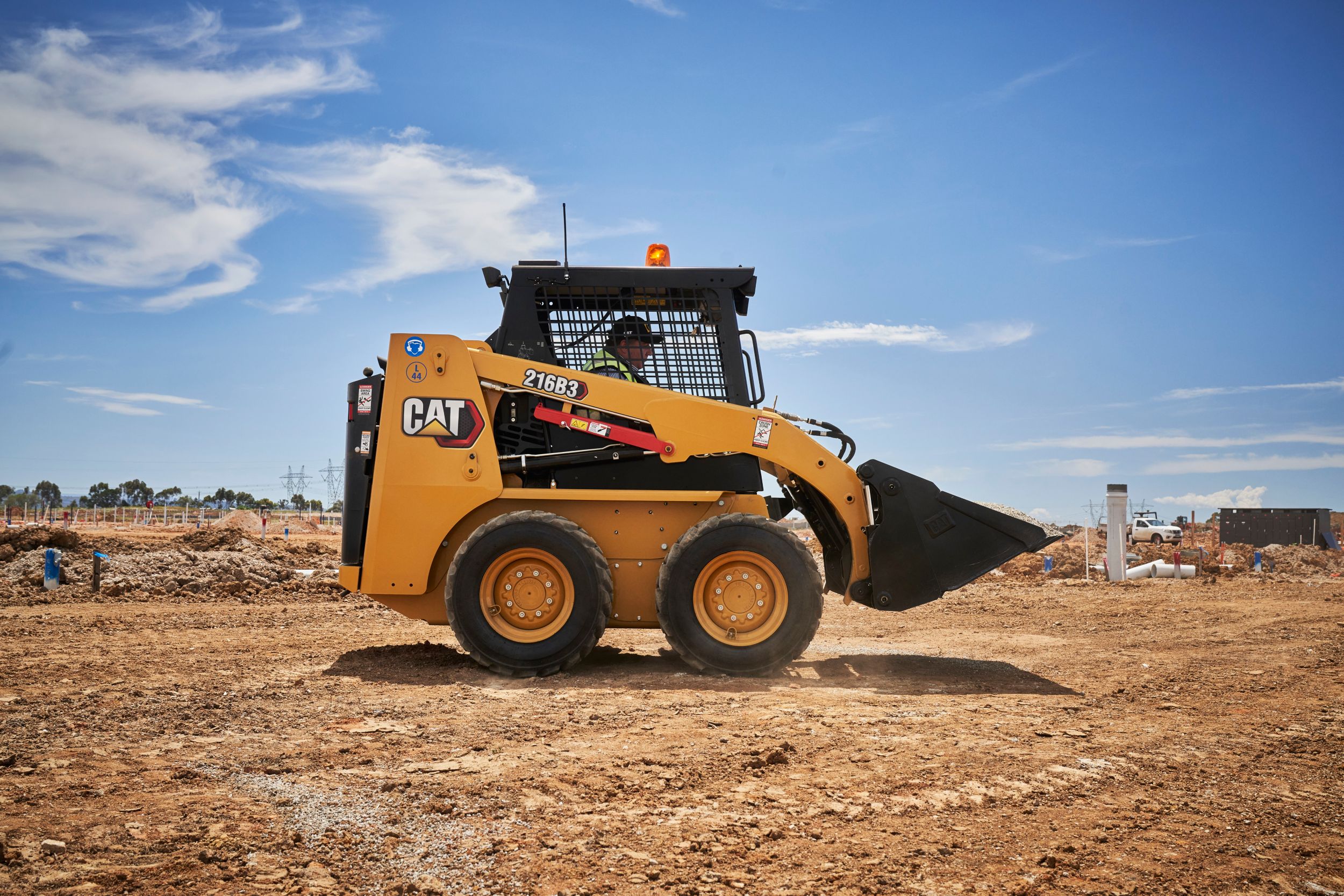 Equipment working on jobsite near dusk