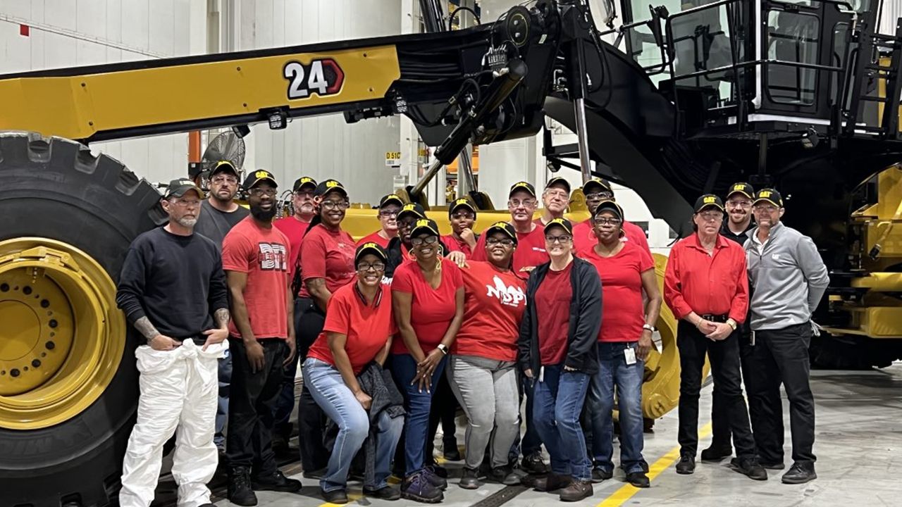 Group of people pose for a photo