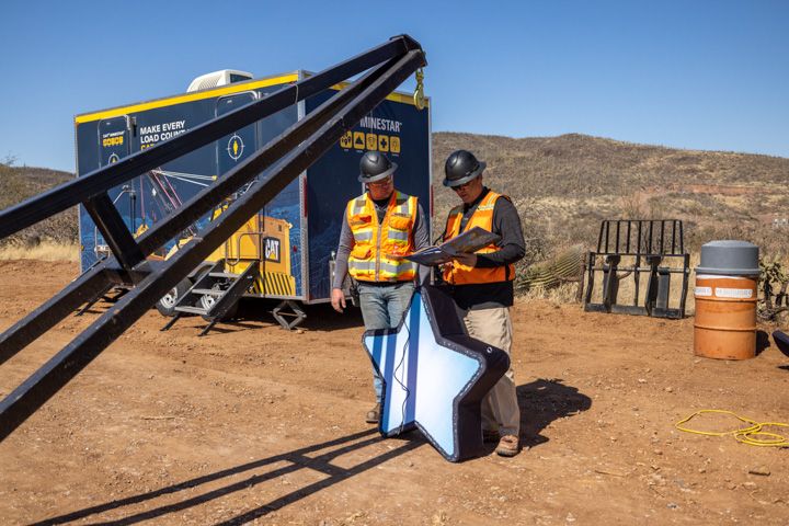 Archie Lyons and Jared Harris ensure the star is ready to take its place in the sky. 