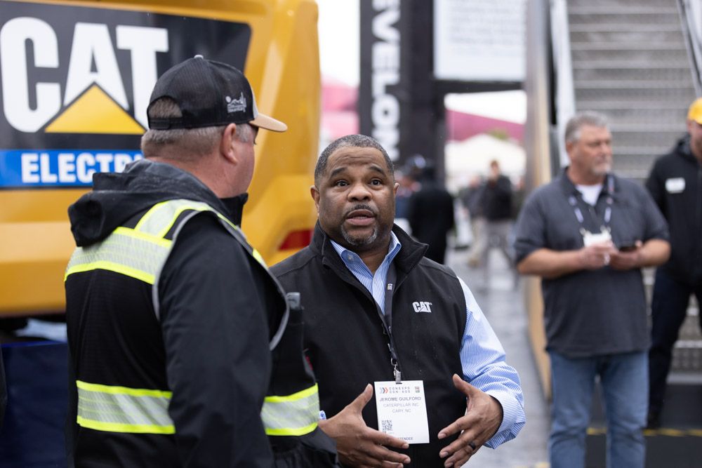 Show worker talks with an attendee