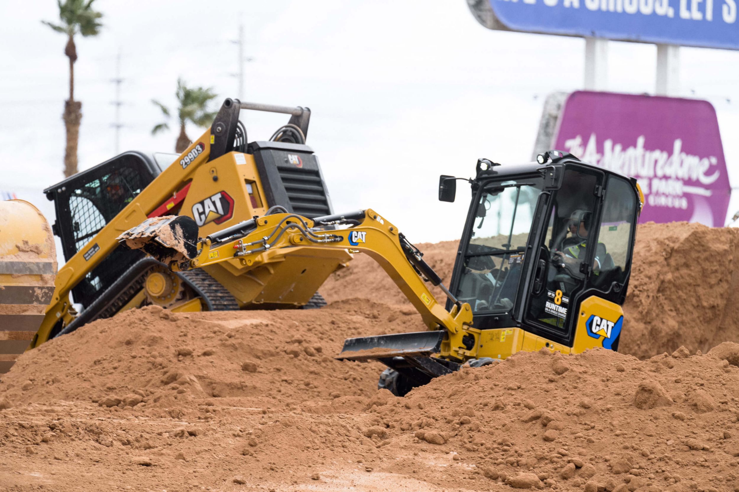A mini excavator during a demo