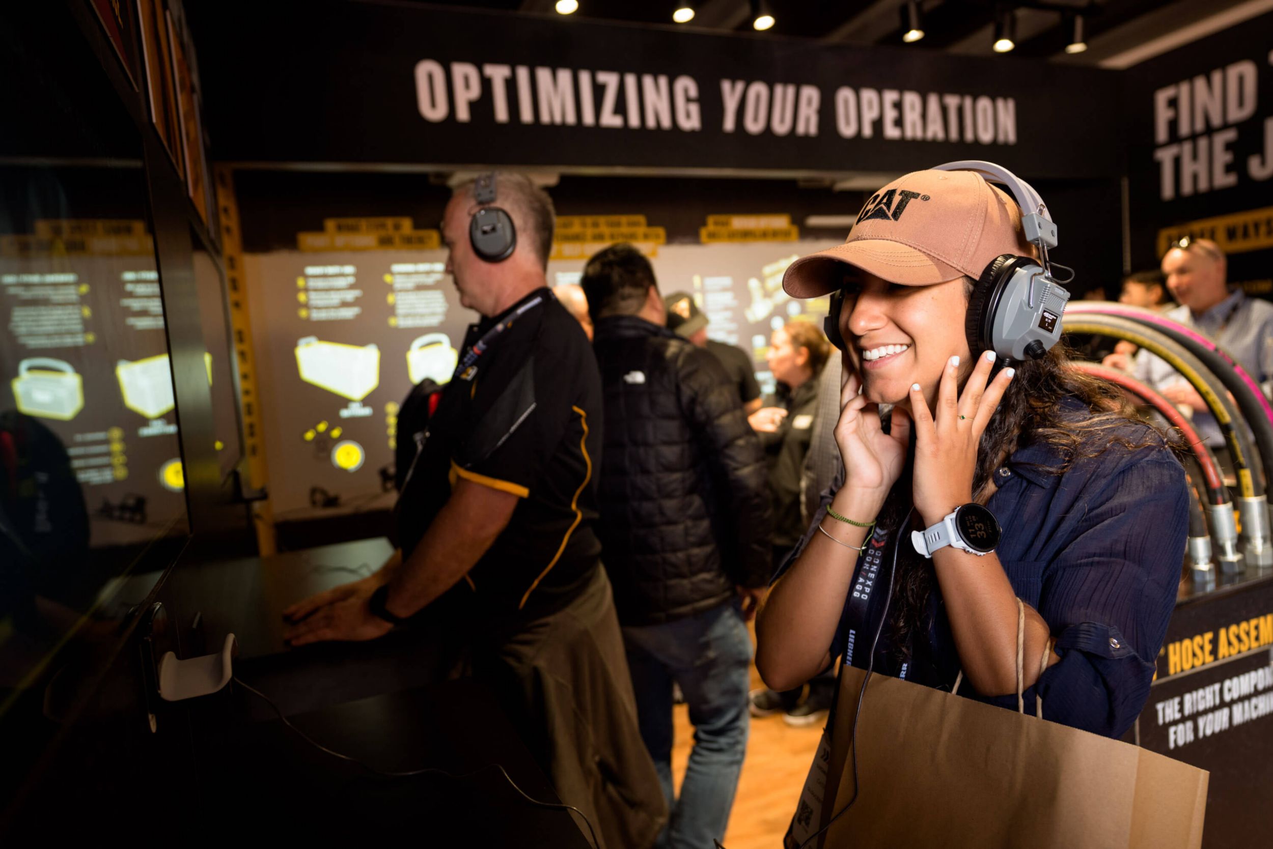 Woman stands at the listening booth