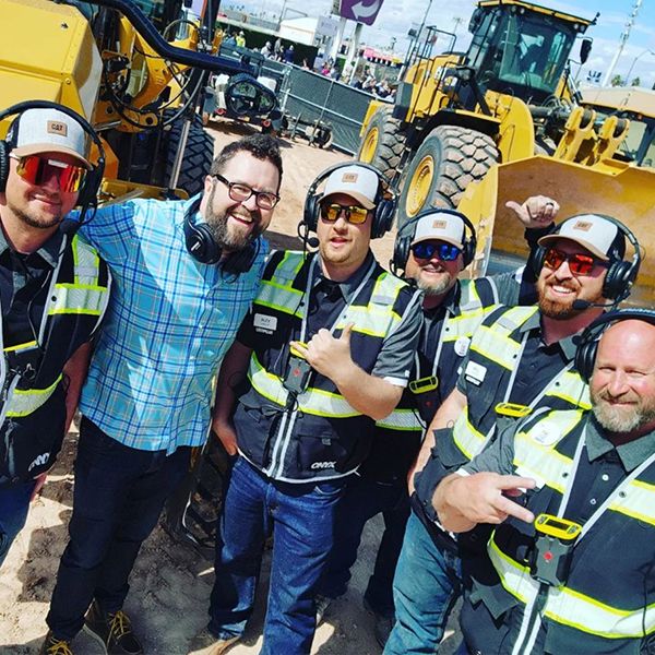 Rutledge Wood gets a photo opp with the expert operators inside Operator Stadium