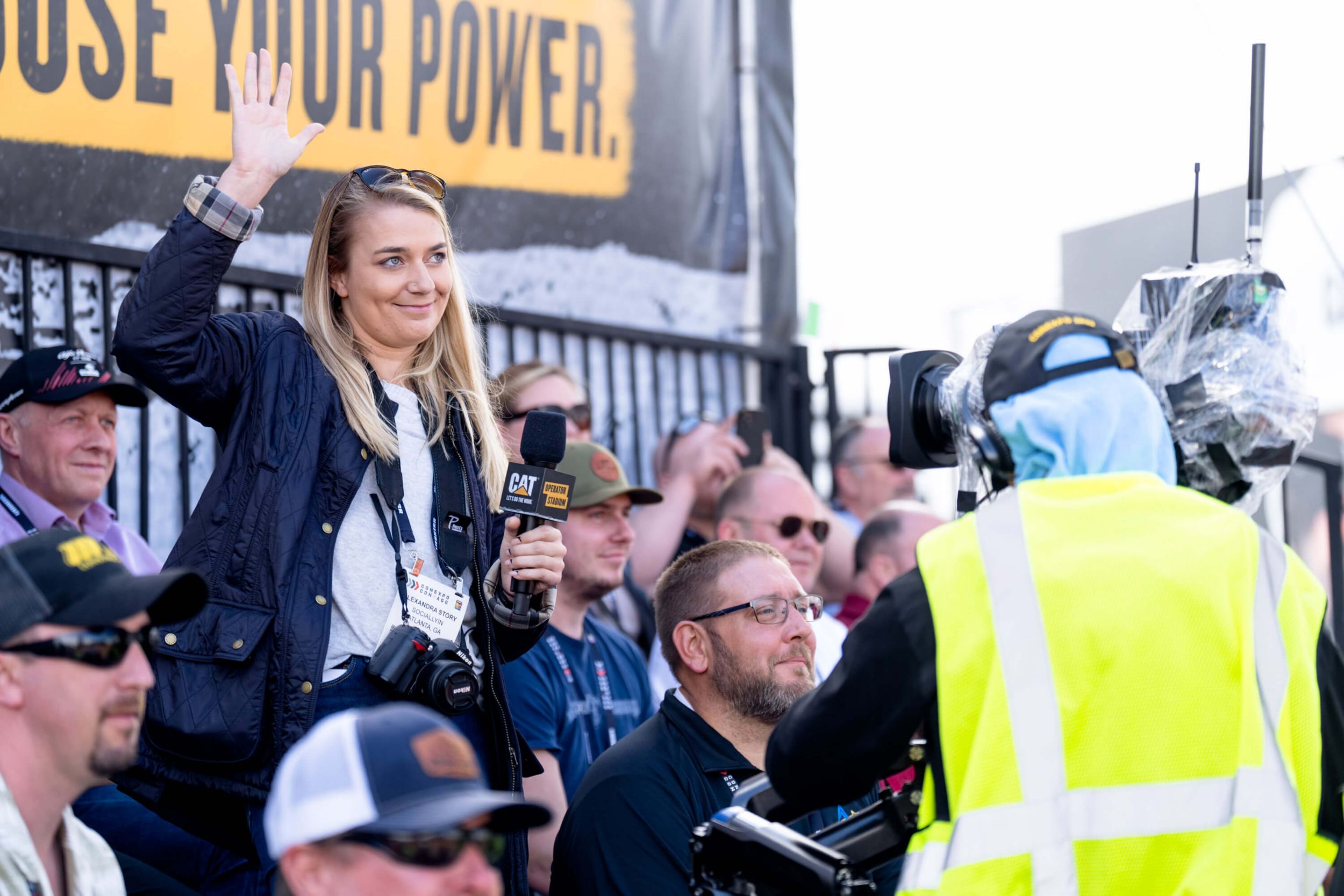 Woman raises her hand at a demo