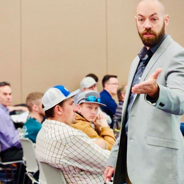 Cat Safety Services expert Justin Ganschow speaks to customers about jobsite behaviors