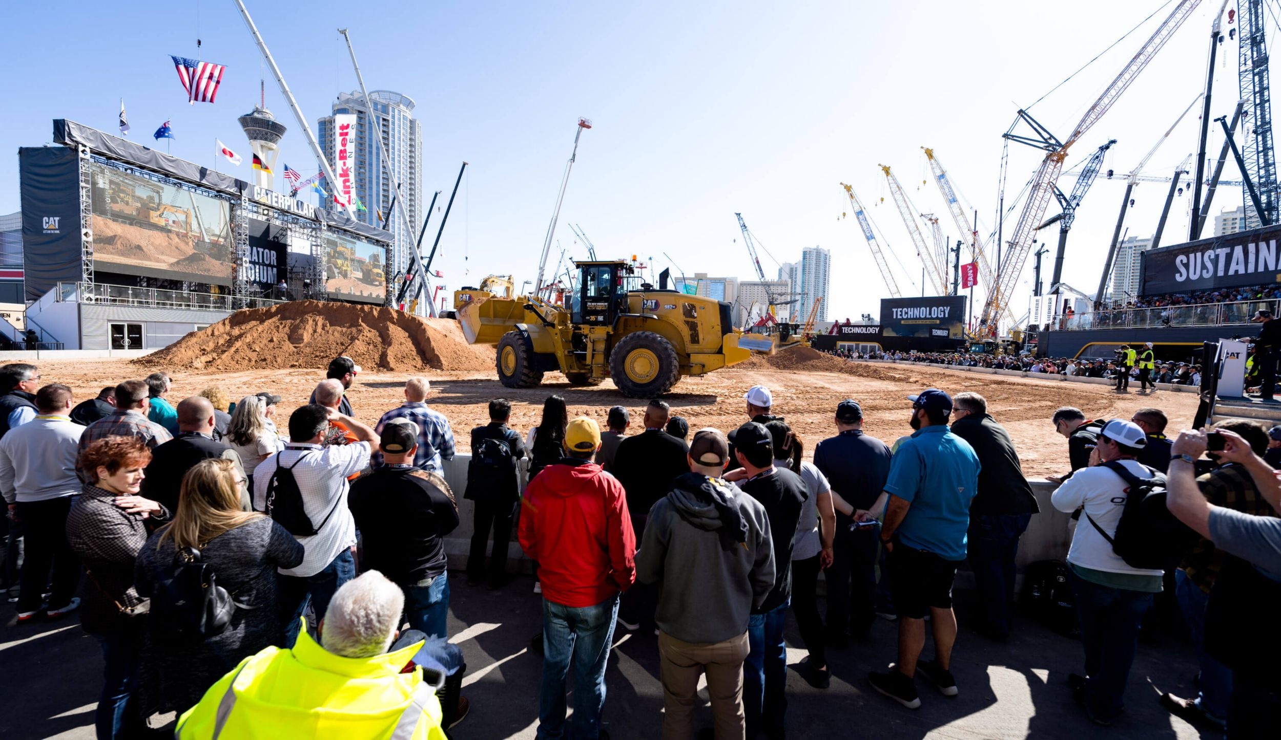 A crowd watches a demo