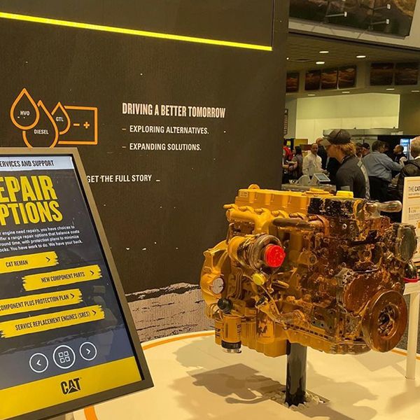 Reman engine display inside the South Hall Caterpillar booth space