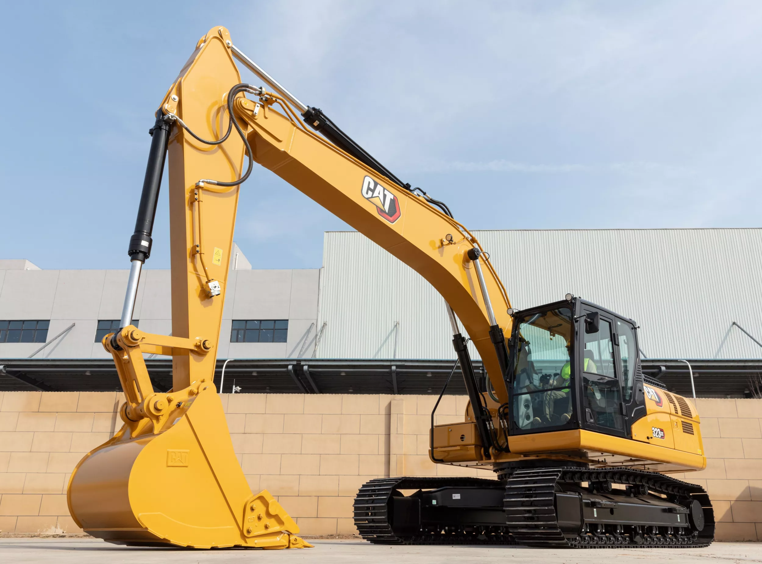 La pelle hydraulique 323 GX Cat est un choix sensationnel pour les entreprises générales qui recherchent un amortissement rapide.