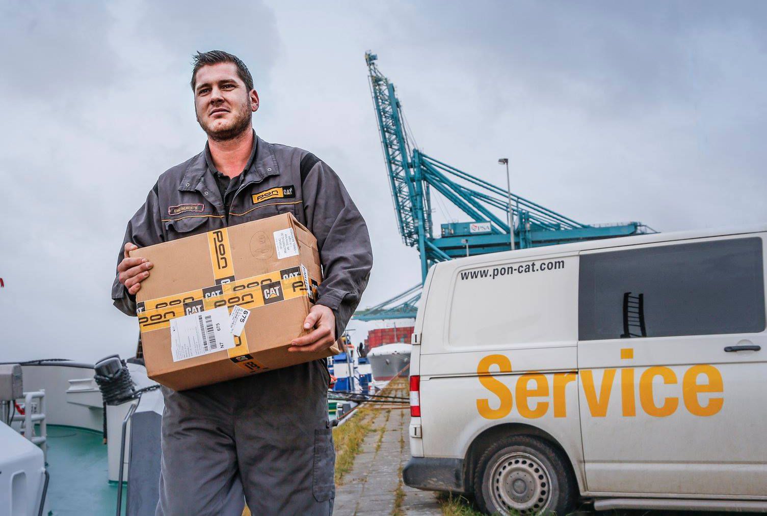 Dealer making a parts delivery on a dock