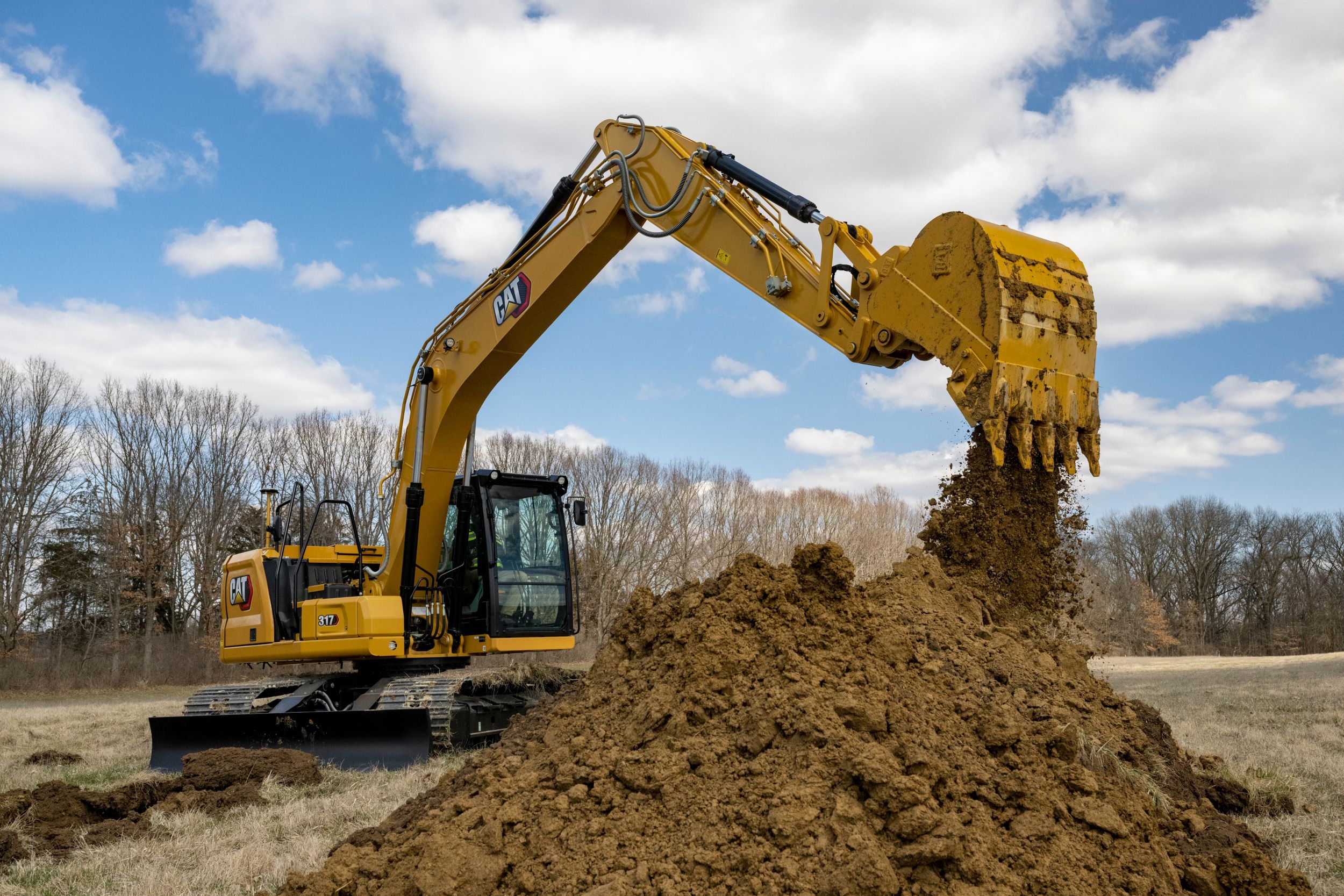 The 317 Hydraulic Excavator boosts productivity on your jobsite. Standard, easy-to-use Cat® technologies, performance upgrades, and low fuel and maintenance costs allow you to move material all day with speed and precision while keeping more money in your pocket.